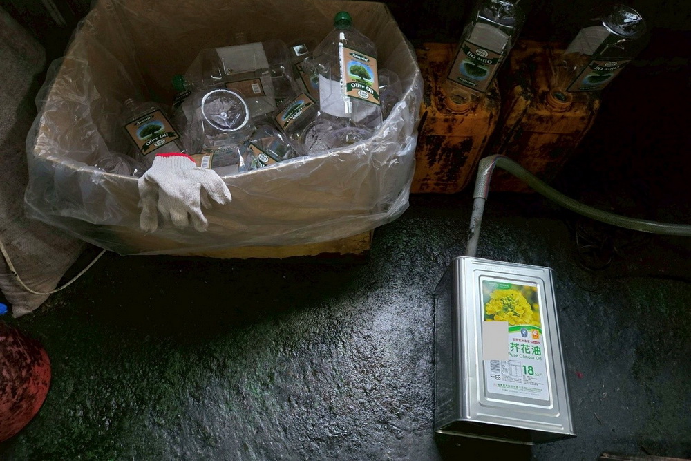 芥花油混充進口橄欖油　調查局春節前夕查獲假油案 17